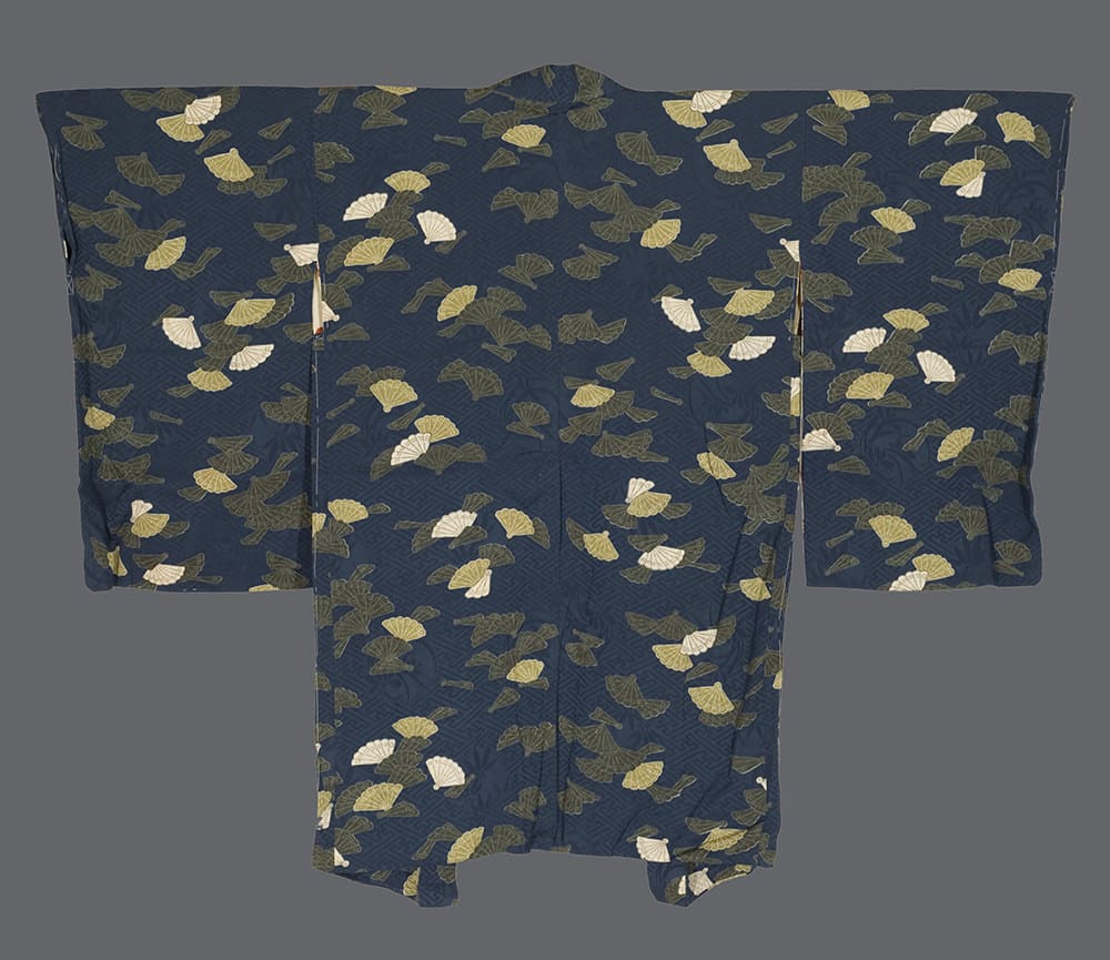 Japanese kimono with navy background and scattered white and gold fans