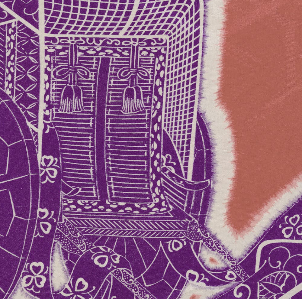Intricate purple and white batik textile with geometric patterns and decorative details
