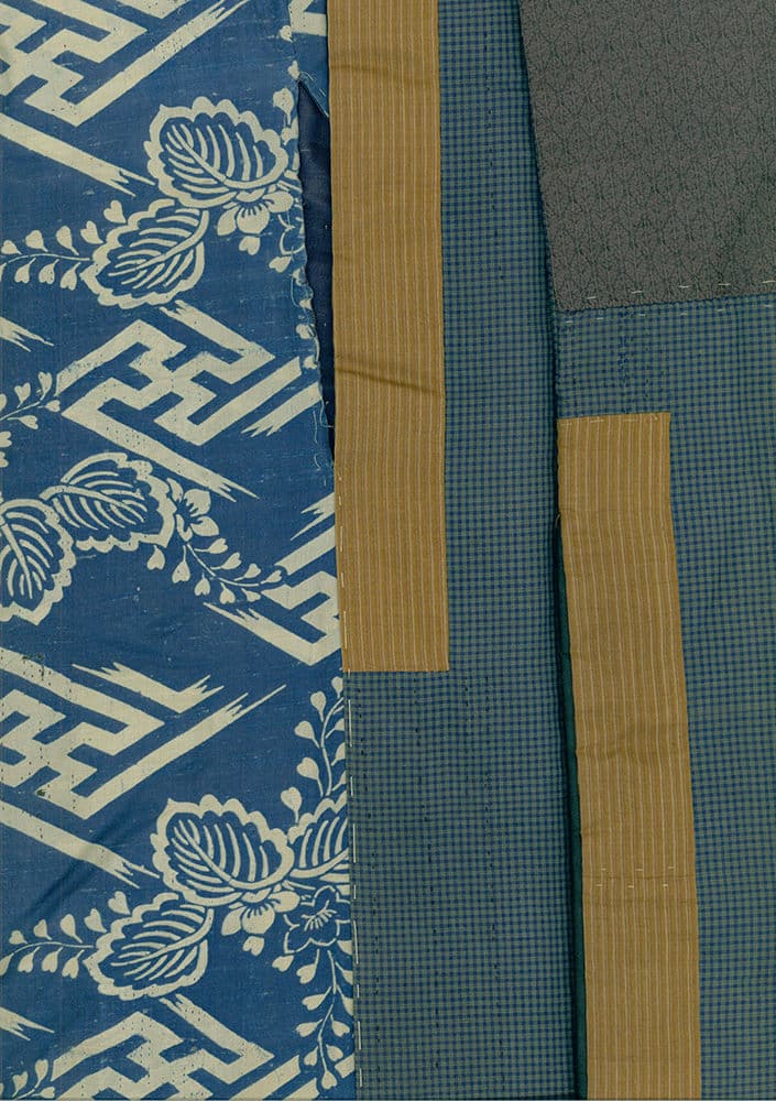 Traditional blue and yellow Japanese textile with floral geometric pattern