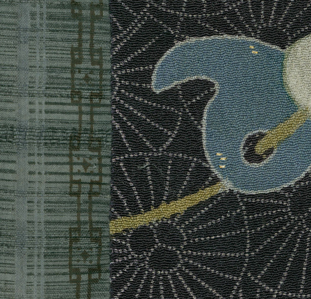 Abstract textured fabric with blue, black, and yellow geometric shapes