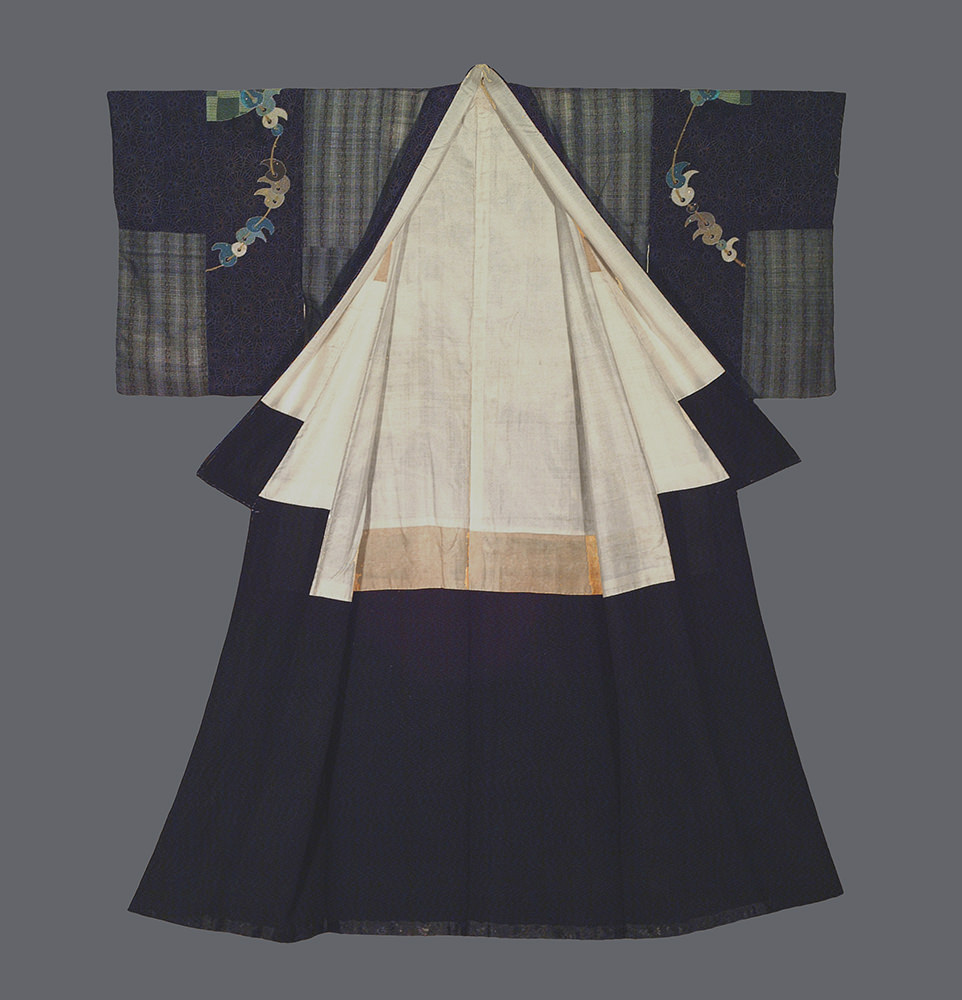 Traditional Japanese kimono with navy blue and cream-colored layers