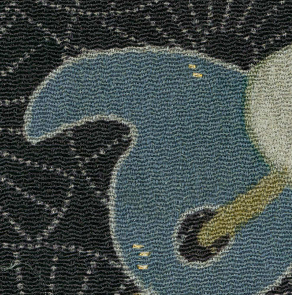 Textured fabric with blue and black woven pattern and yellow accents