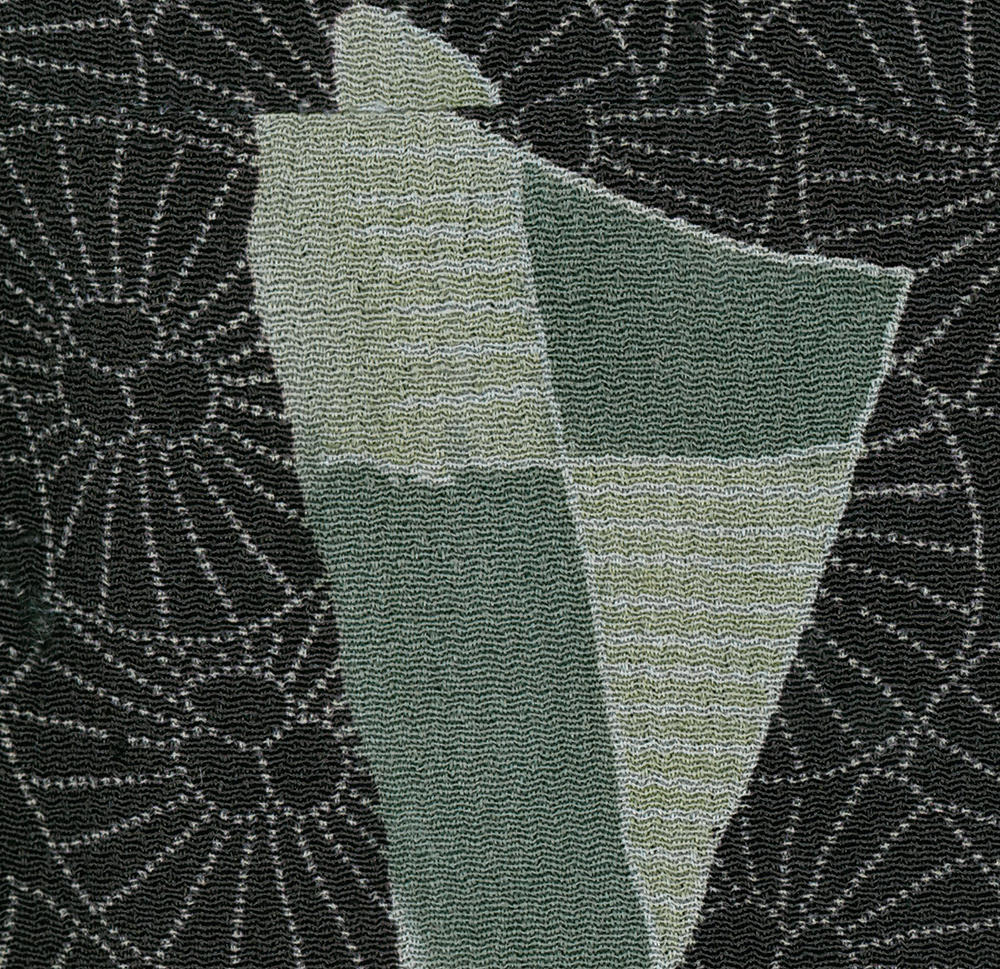 Abstract geometric tapestry in shades of green and black