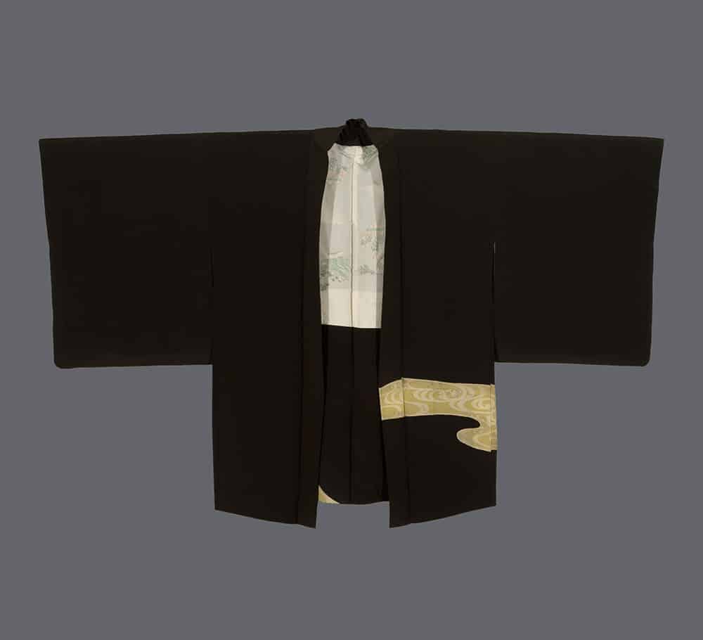 Traditional black Japanese kimono with white and gold details