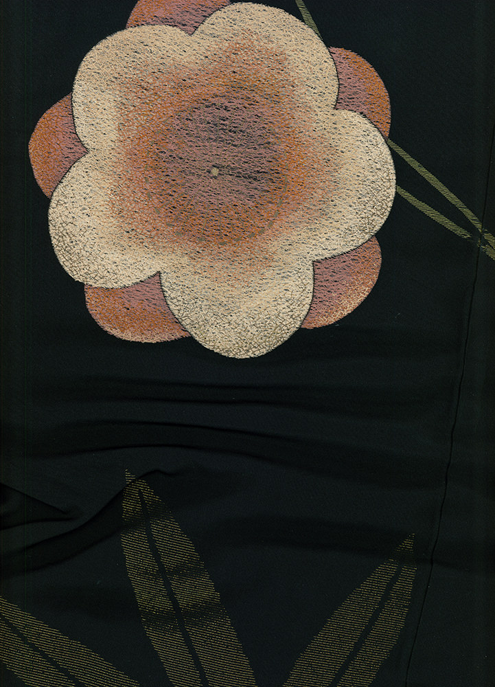 Vintage-style textured flower with soft orange and cream petals