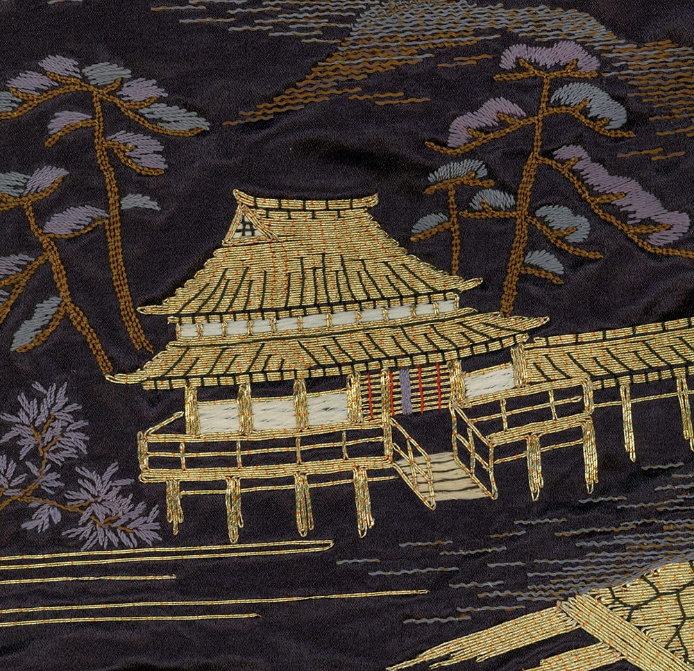 Golden Japanese pagoda with trees on dark embroidered textile background