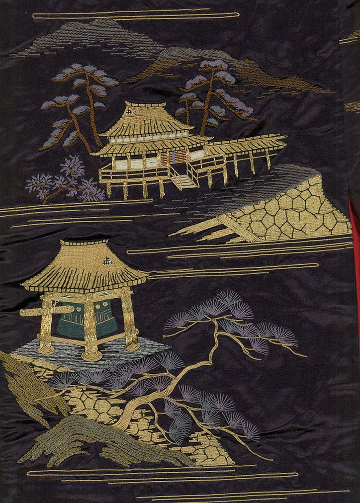 Japanese embroidered artwork with traditional buildings and pine trees