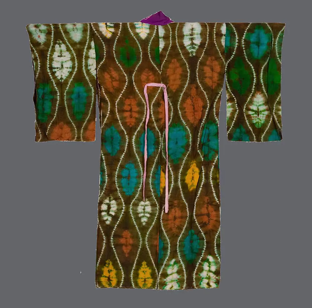 Silk shibori juban with undulating lattice and oval medallions in teal, green, orange, yellow, and white on rich brown, dyed on coarse hand‑woven silk