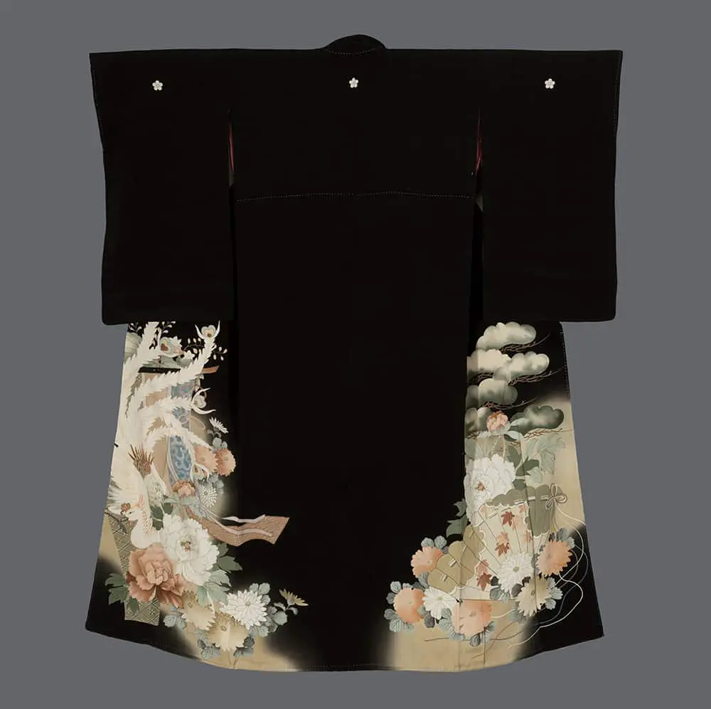 Black yuzen‑dyed kurotomesode with detailed phoenix, peonies, chrysanthemums, and metallic‑thread couching adding luminous highlights