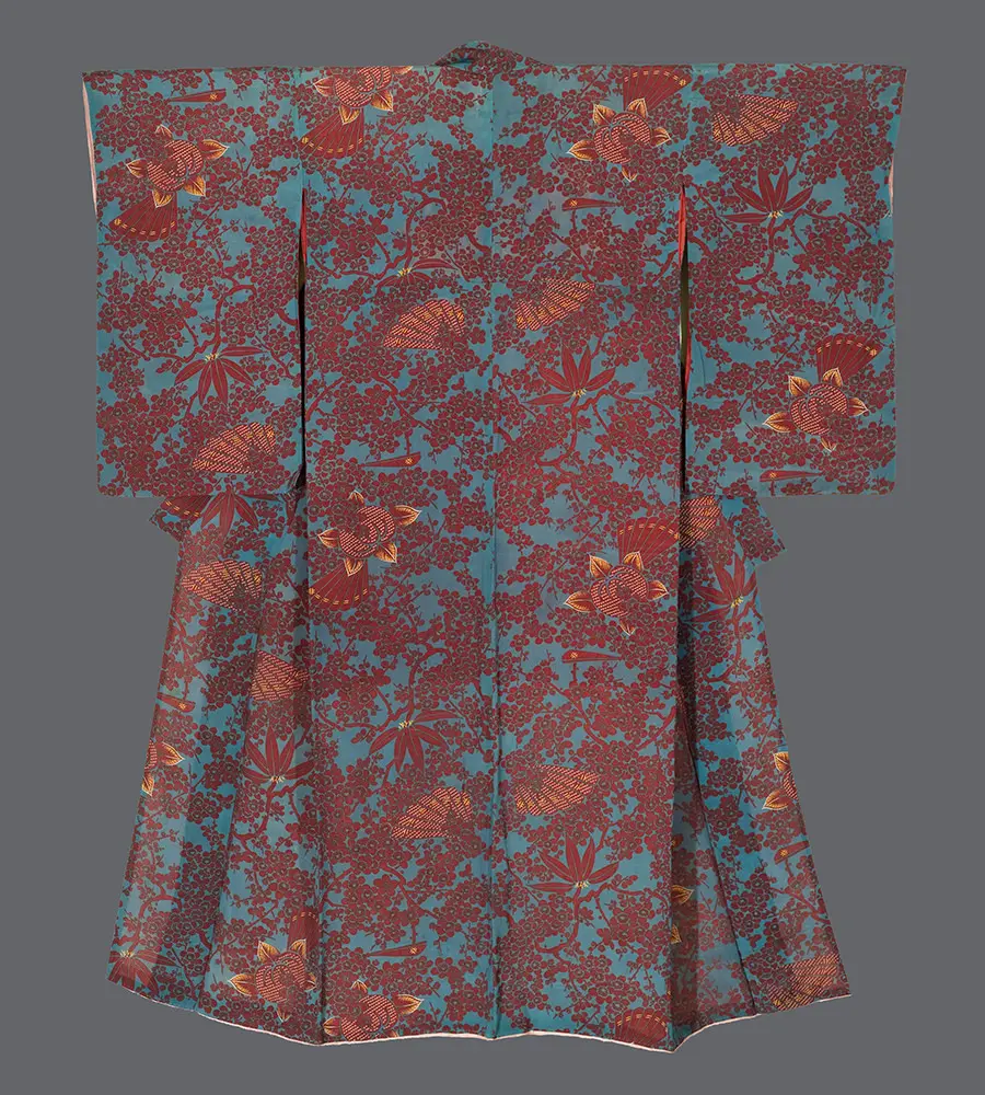 Silk kimono with dense red and yellow folding fans interwoven with bamboo and ume sprays on a softly saturated blue silkscreened ground