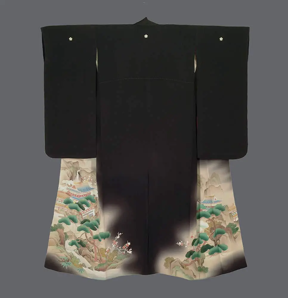 Black kurotomesode silk kimono with a misty landscape of pavilions, pine trees, and mountains on the hem.