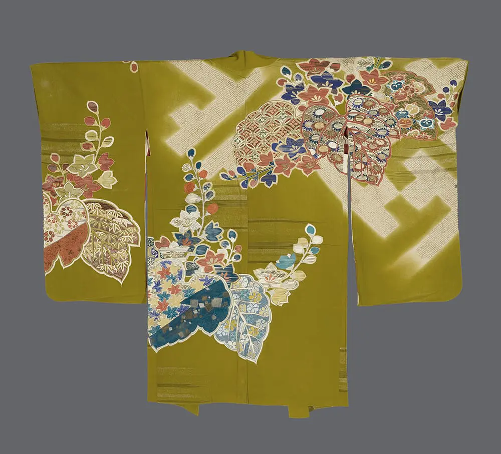 Moss-green rinzu silk haori with yuzen-dyed flowers, gold metallic couching, and a white geometric lattice pattern.