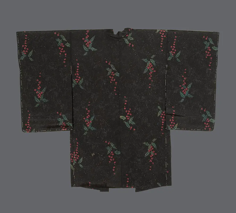 Black rinzu silk haori with printed green holly and pink berries, featuring a turquoise and orange shibori lining.