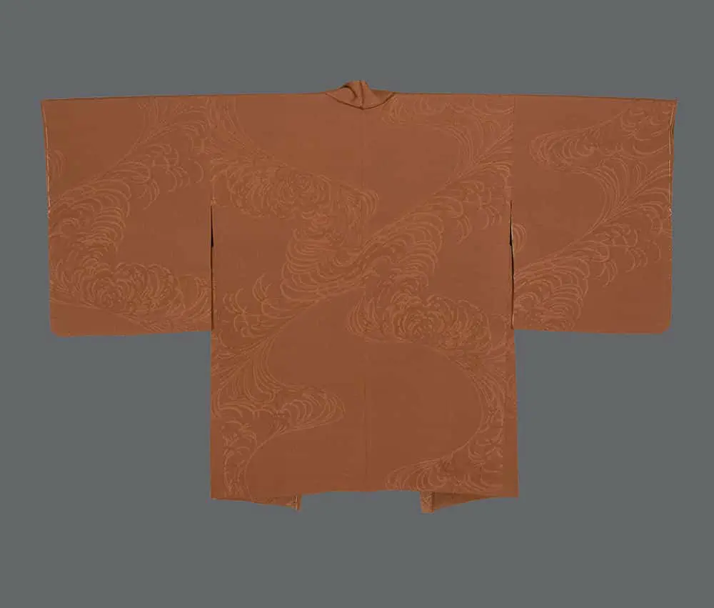Terracotta-orange rinzu silk haori with an all-over woven damask pattern of large scrolling cloud and water motifs.