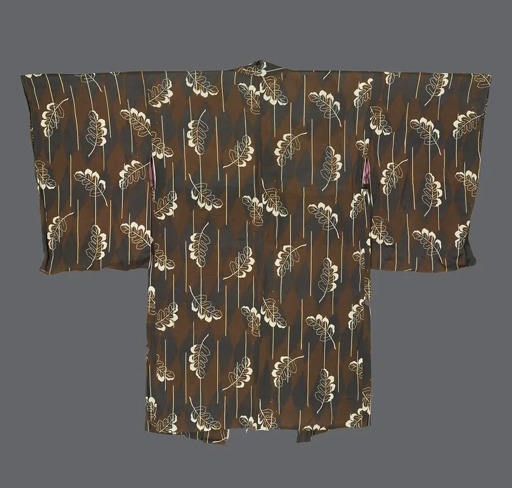 Chocolate-brown silk haori with cream and ochre silk-screened oak leaves and vertical rain line patterns.
