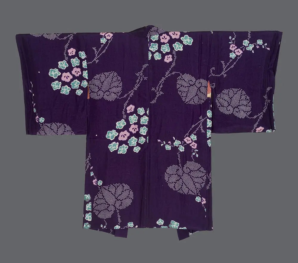 Royal-purple jiginu silk haori with printed pink and green flower clusters and white-dotted heart-shaped leaves.