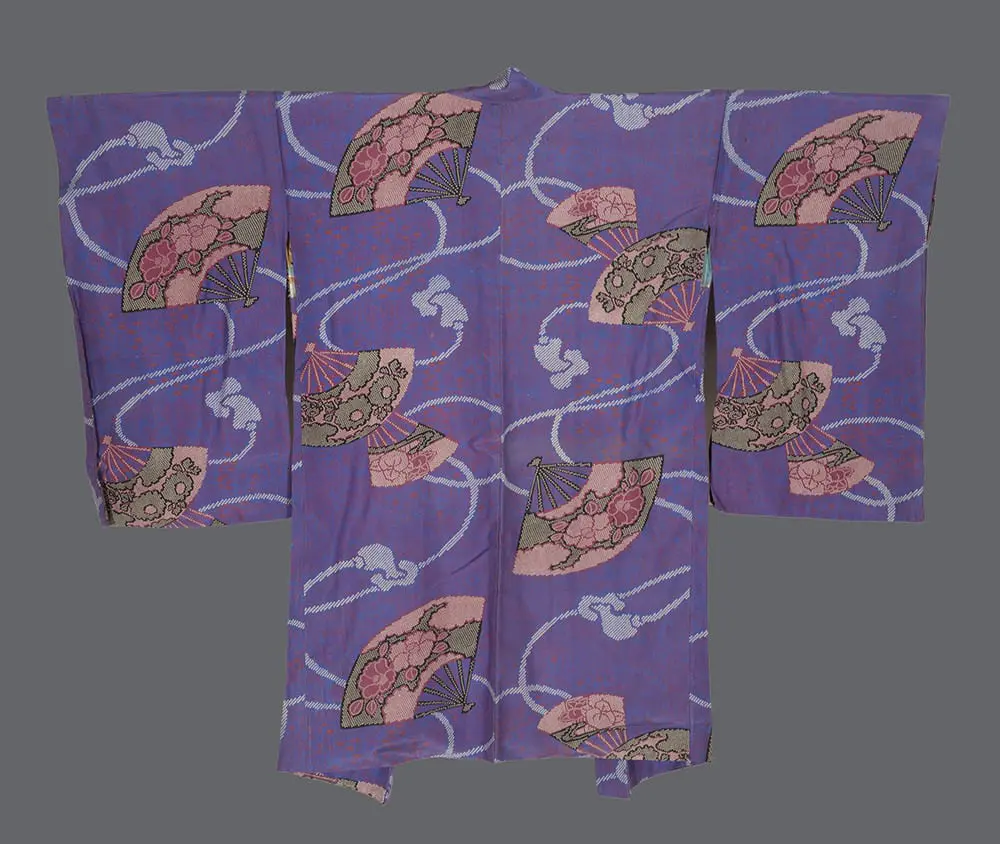 Periwinkle-blue silk haori with faux-shibori printed folding fans containing pink flowers and white swirling cord patterns.