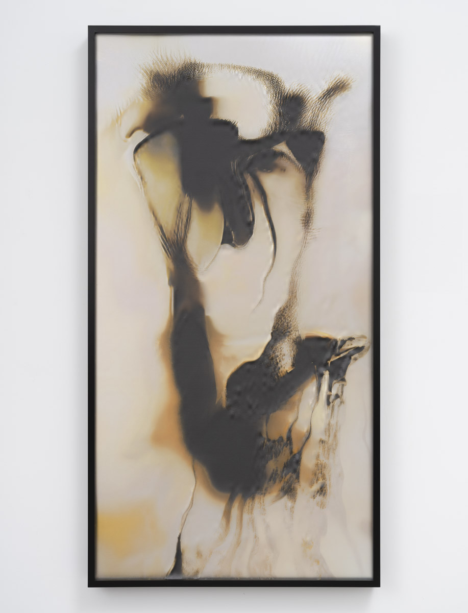 An abstract painting on a white wall in a black frame. 
