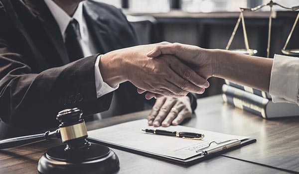 handshake lawyer and client image