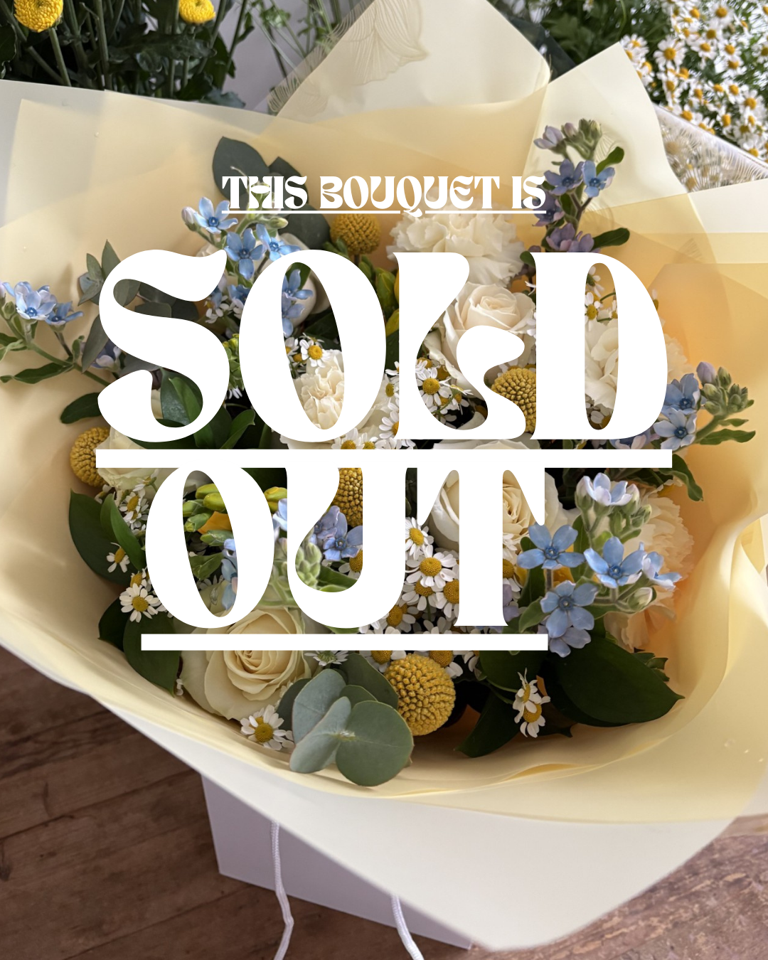 Avalanche roses, tweedia, craspedia, tanacetum daisies, freesia, carnations and foliage make up this sweet-scented, spring bunch.