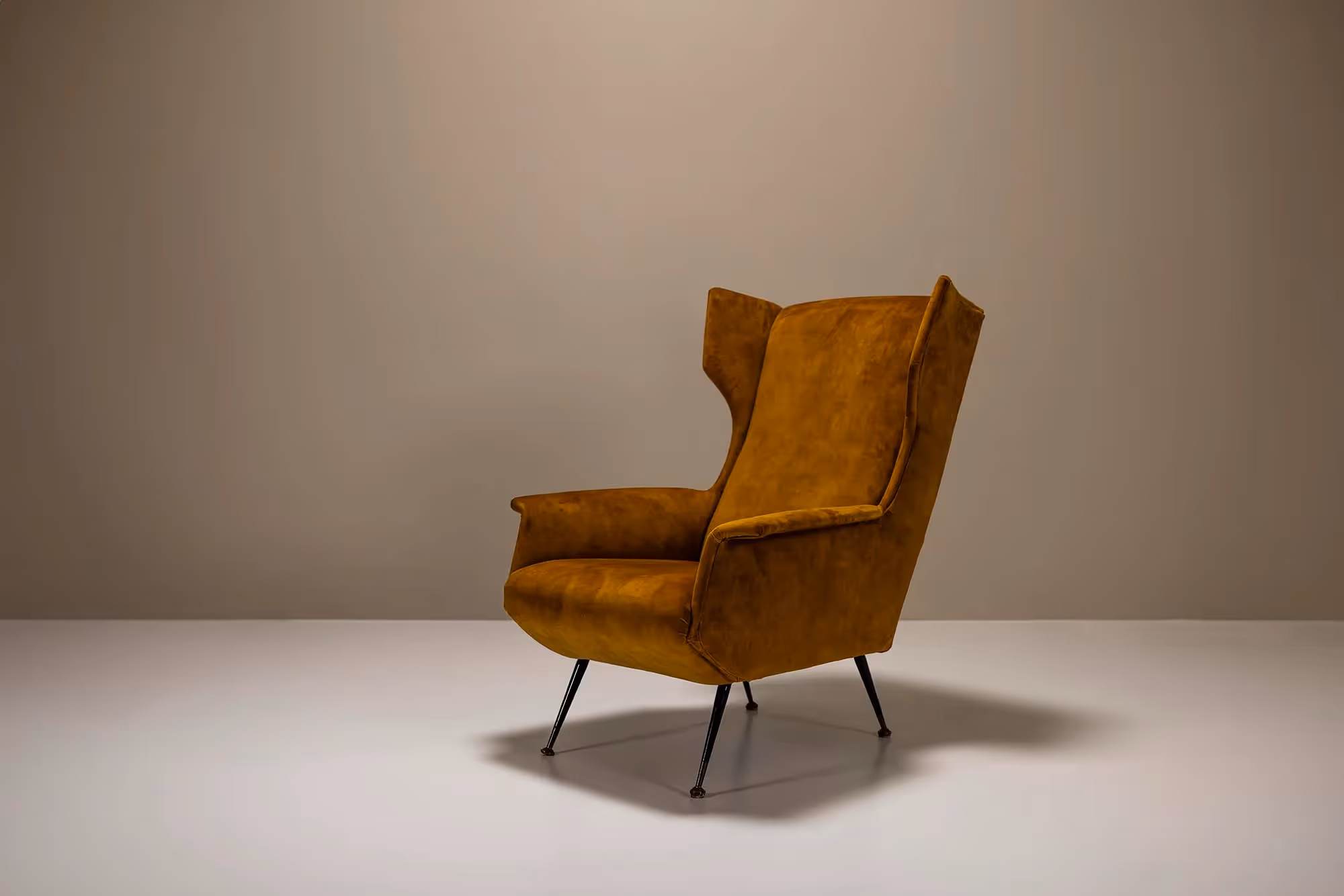 Italian Wingback Lounge Chair In Ocher And Metal, Italy 1950's