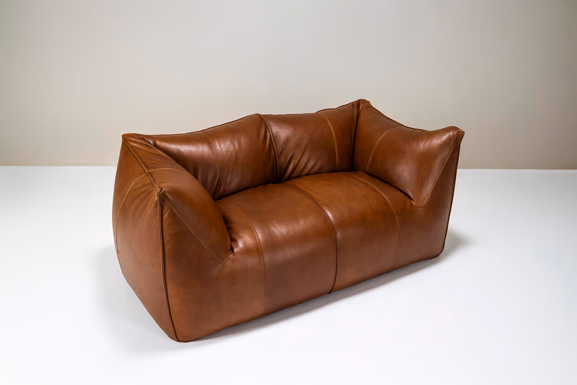 newly upholstered cognac leather bambole sofa