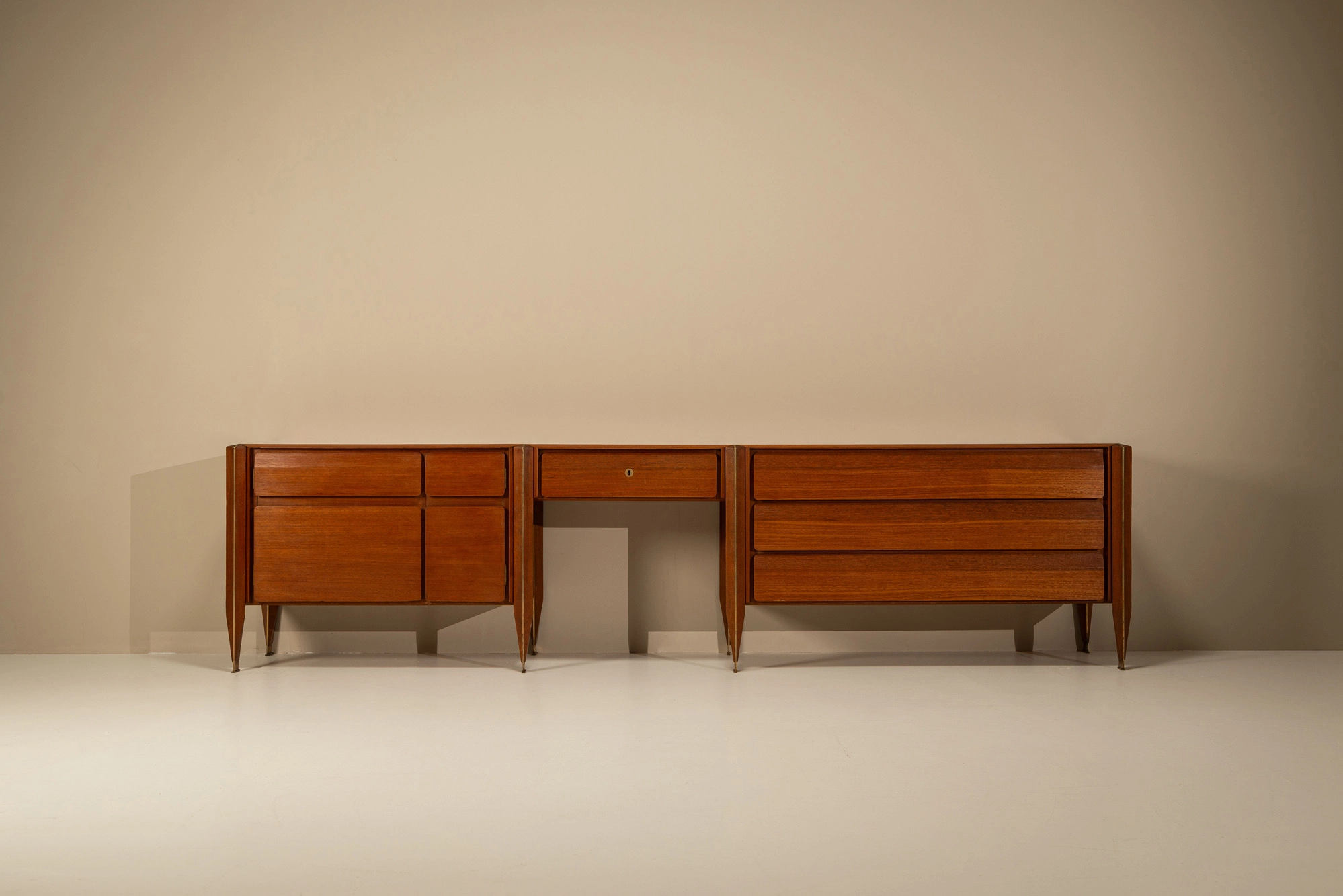 Asymmetrical Giulio Moscatelli sideboard with suspended cabinets and central writing space