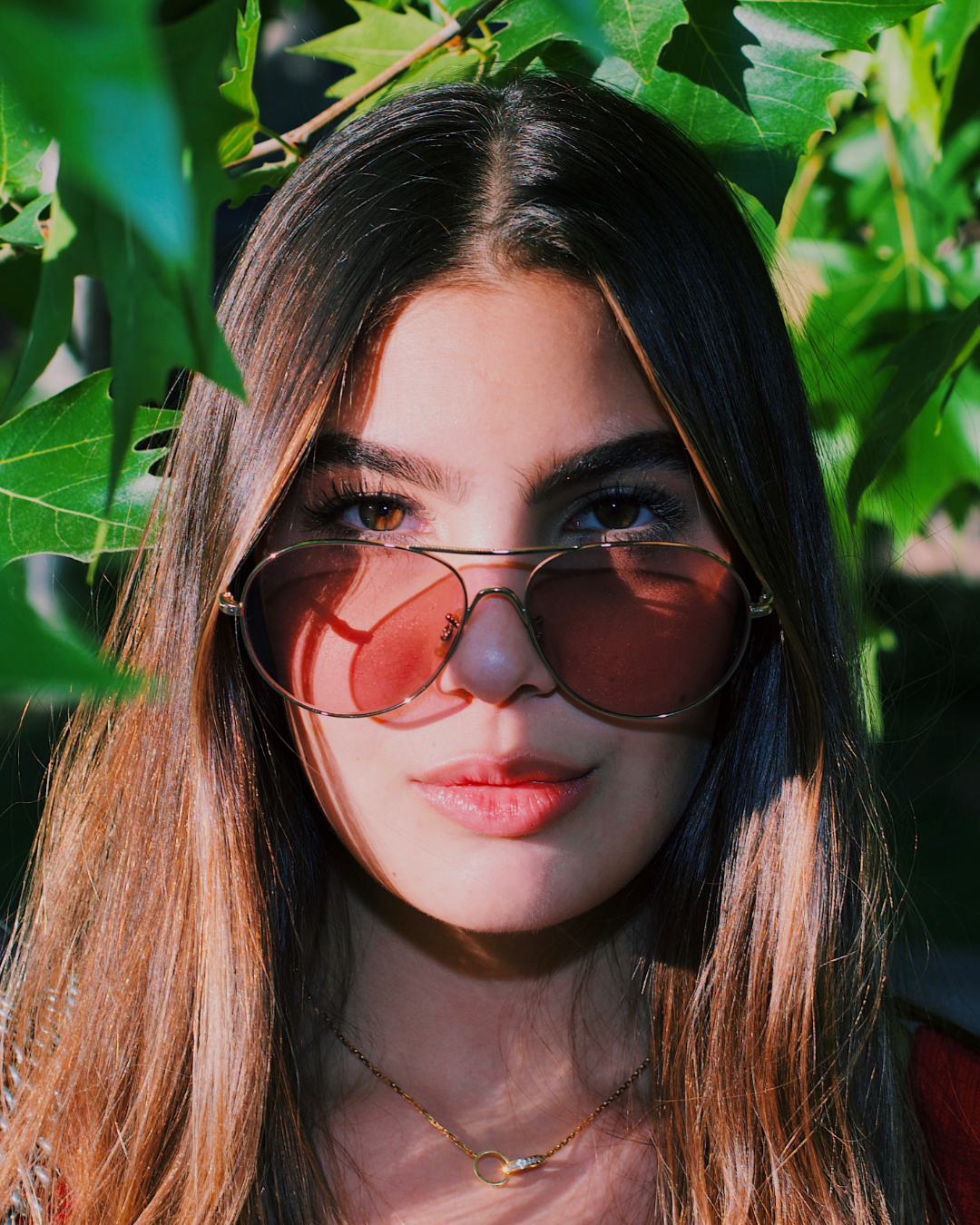 Woman posing with glasses