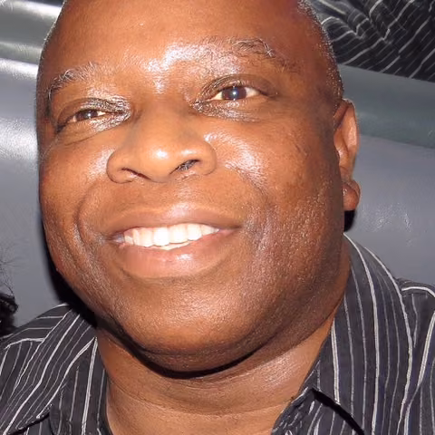 Curtis T.