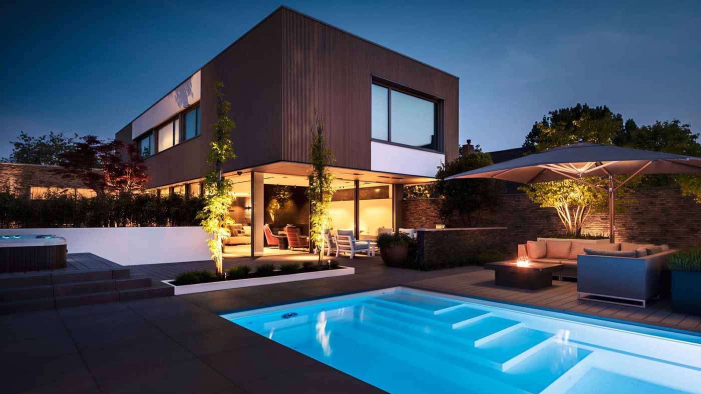 Starline Pool at night, beautifully lit HTP Group