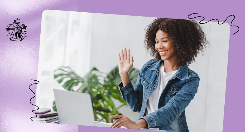 An image of a woman sitting in front of a laptop.