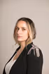 Portrait photo of Daniela Herrera in black jacket