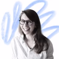 A black and white headshot of Anamaria against a white background