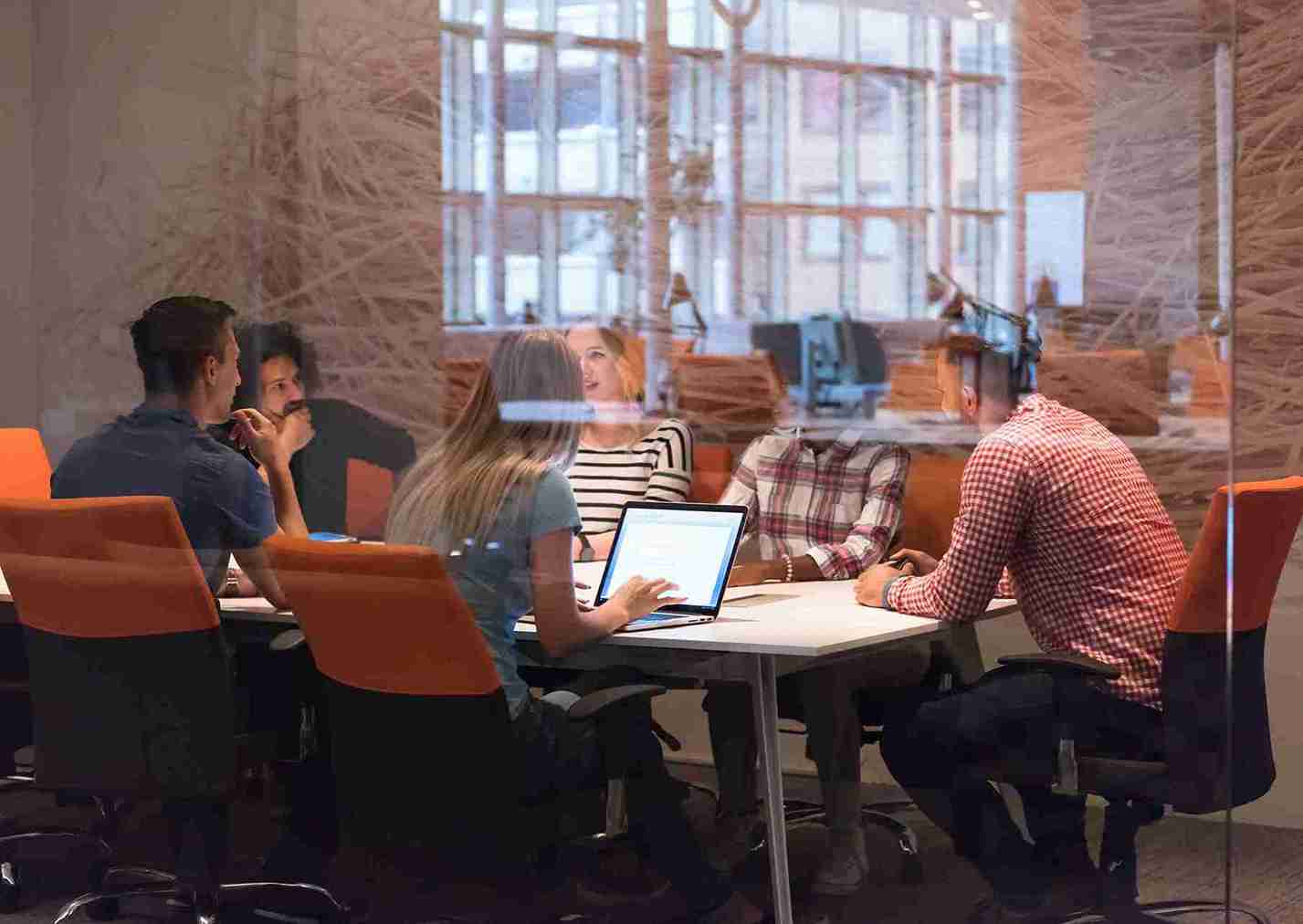 An image of people having a meeting.