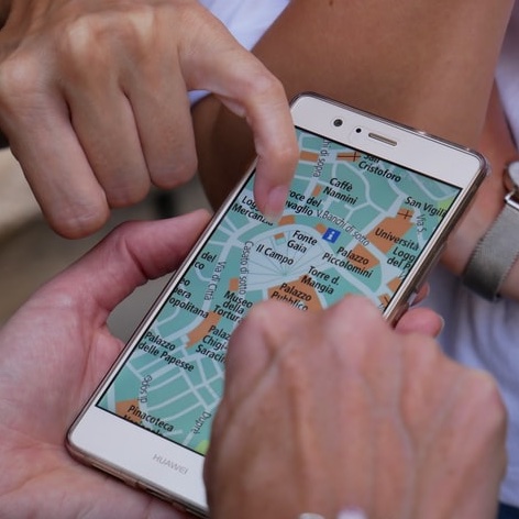 People looking a map from a mobile phone