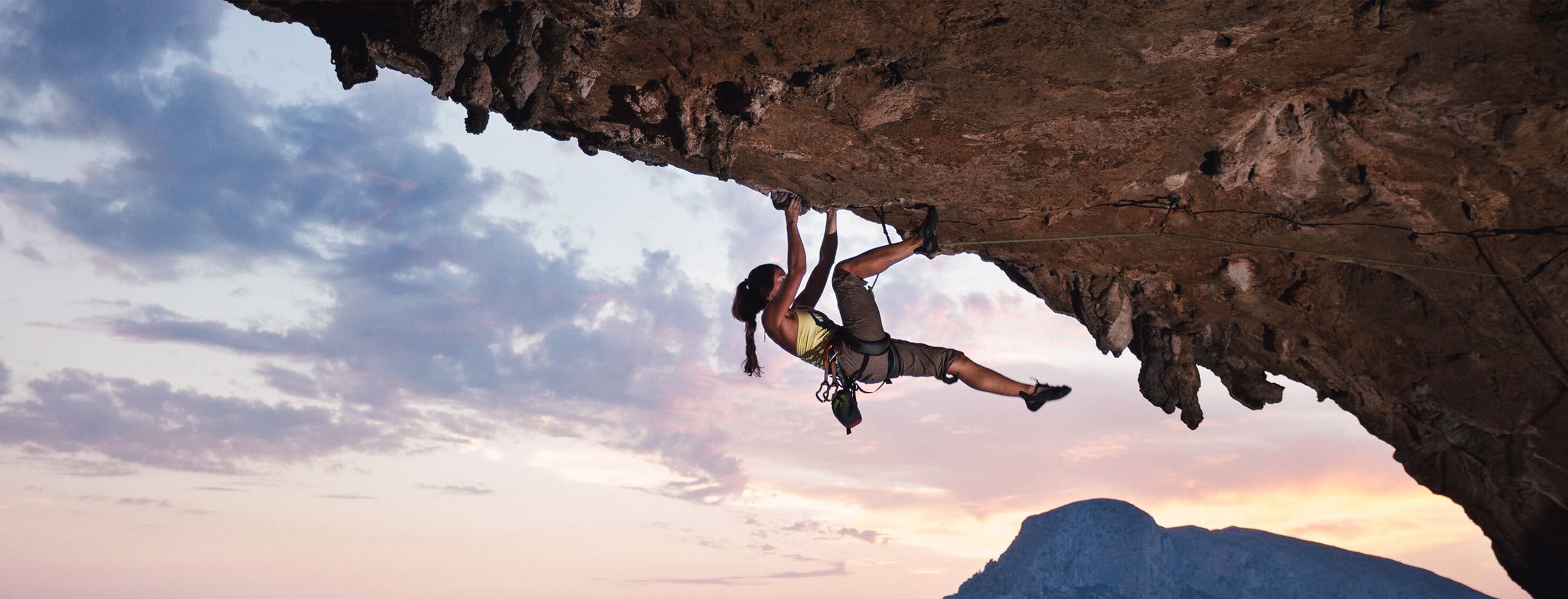 man on hard mountain