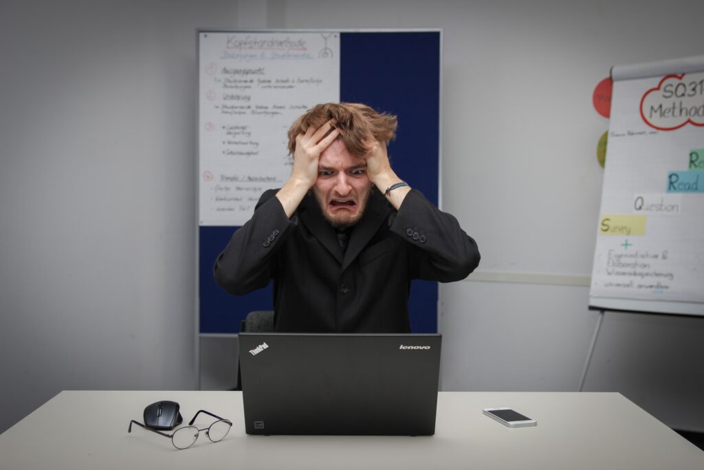 Man experiencing creative block 1024x683