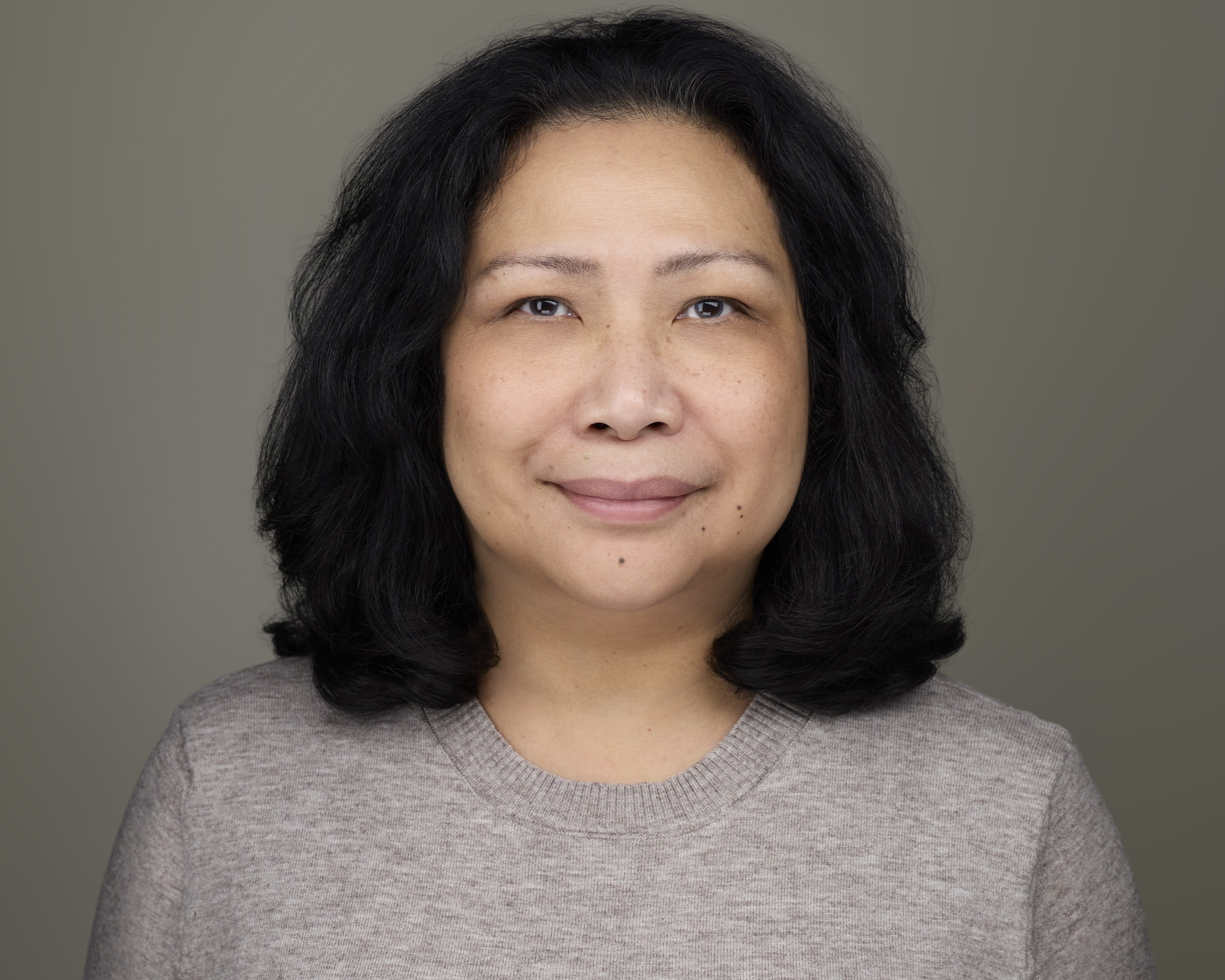 Professional portrait of Marlyn Dalmacio