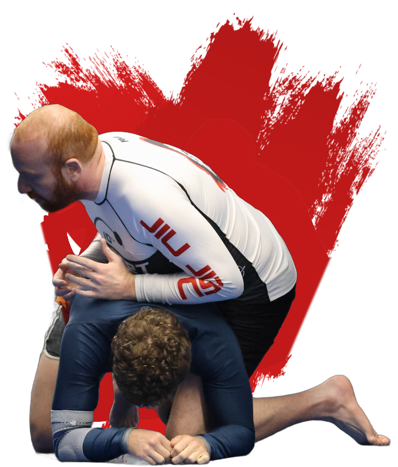 Adam Sachnoff, head instructor at 10th Planet San Mateo, demonstrating top control on a training partner