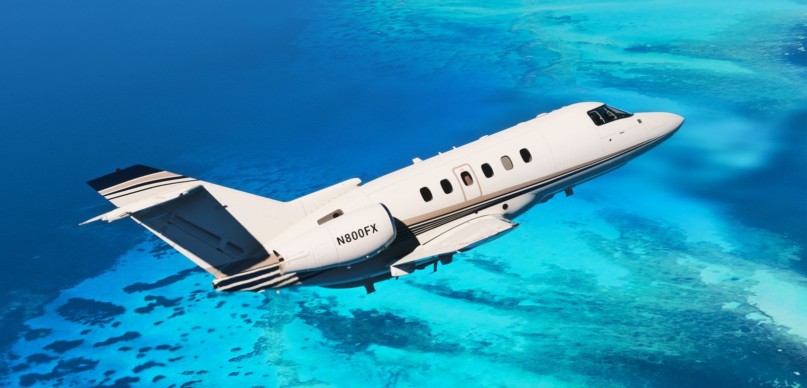 FlightFX Hawker 800XP flying above turquoise coastal waters in MSFS 2024