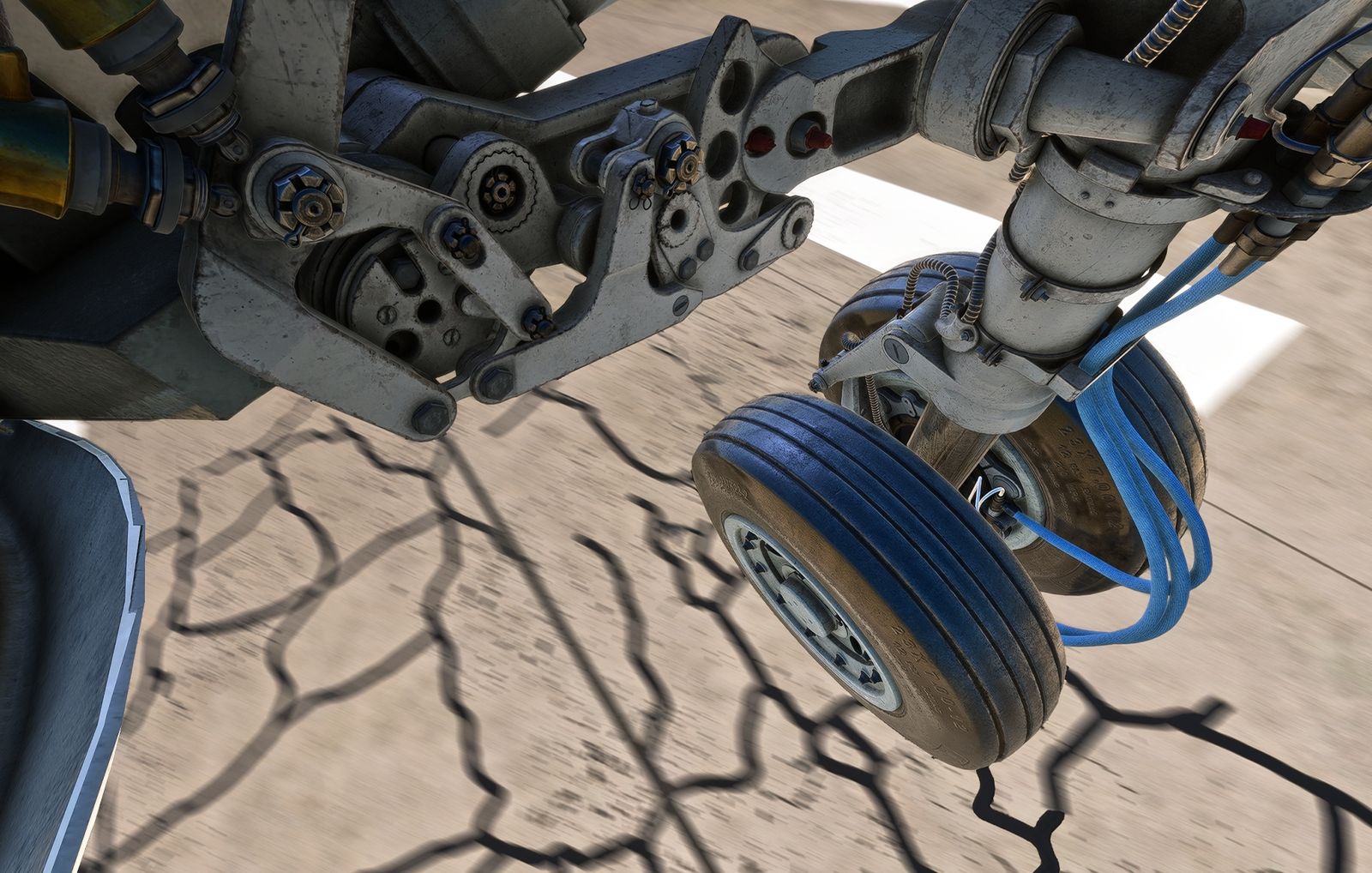 Close-up of the Hawker 800XP landing gear, twin wheels, strut and hydraulic lines