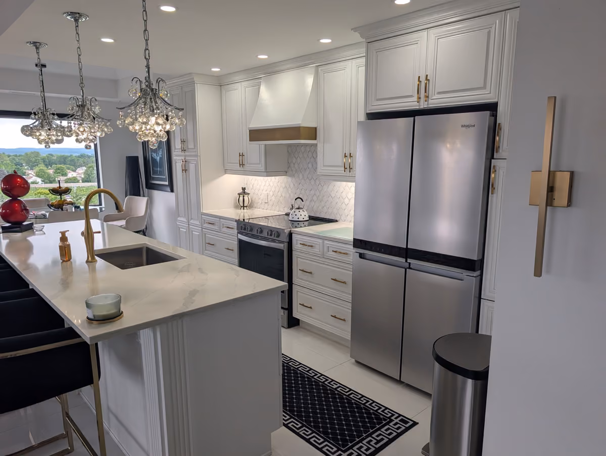 Kitchen cabinets have been refreshed with professional kitchen cabinet painting in Ottawa, ON.