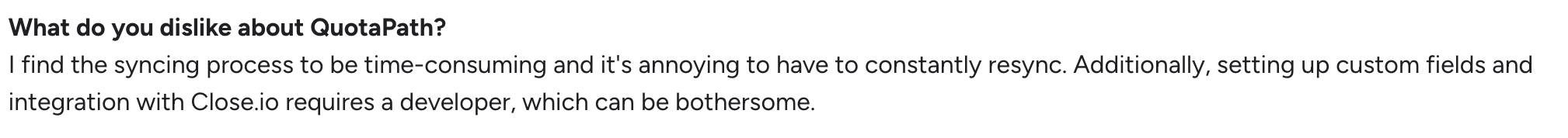 QuotaPath review answering "What do you dislike about QuotaPath?", citing a time-consuming sync process and developer-dependent Close.io integration setup.