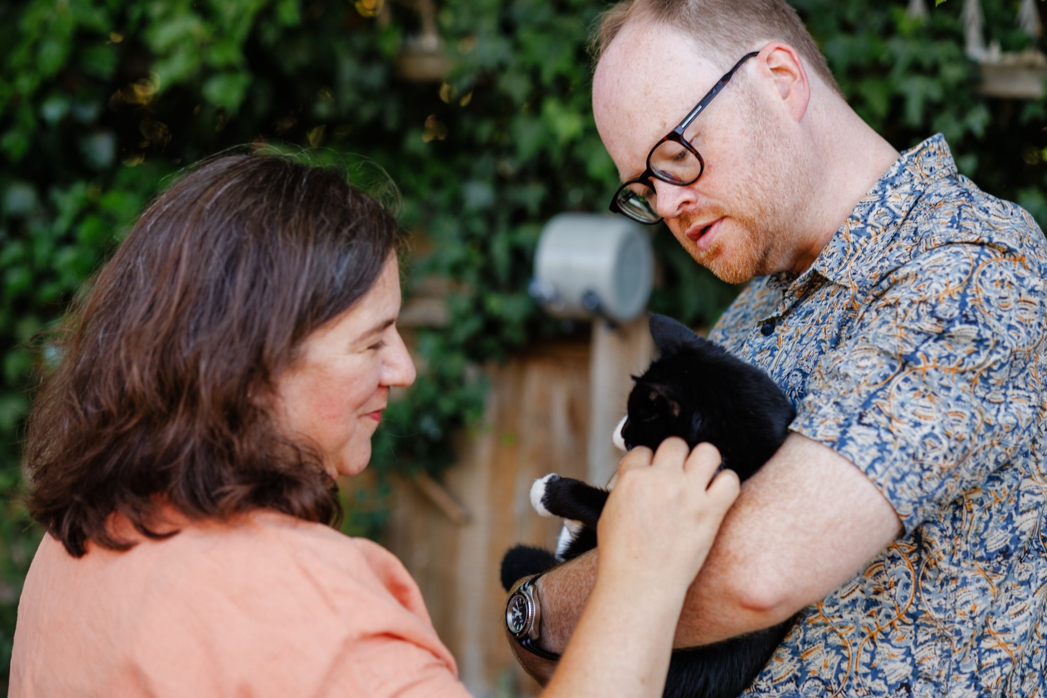 Co-founders of Purrwave, Gemma and Roy, with Xula.