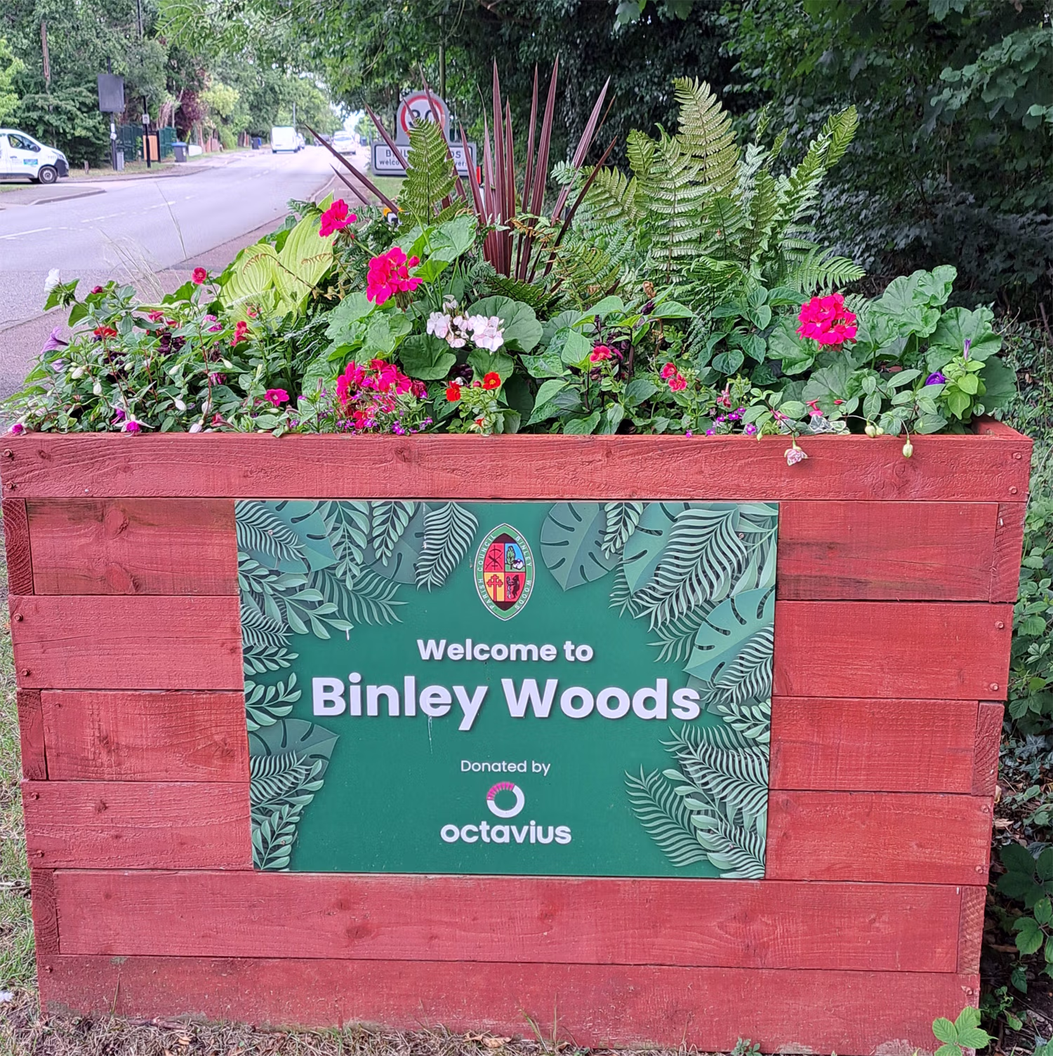 "Welcome to Binley Woods" Planters