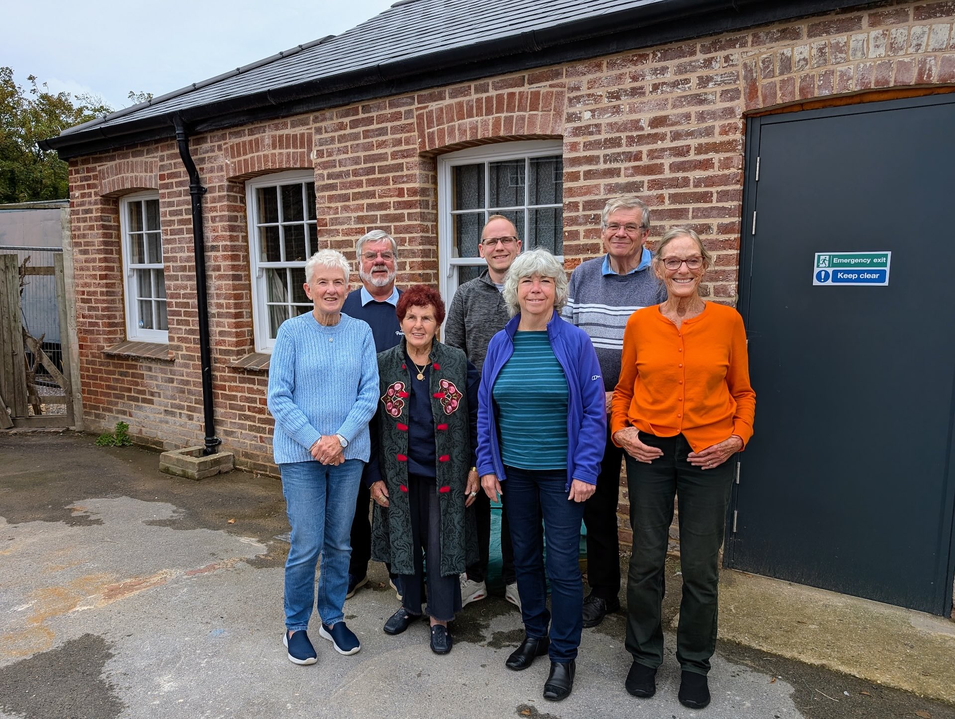 Selsey Pavilion Trust trustees standing outside the small hall at the Selsey Pavilion