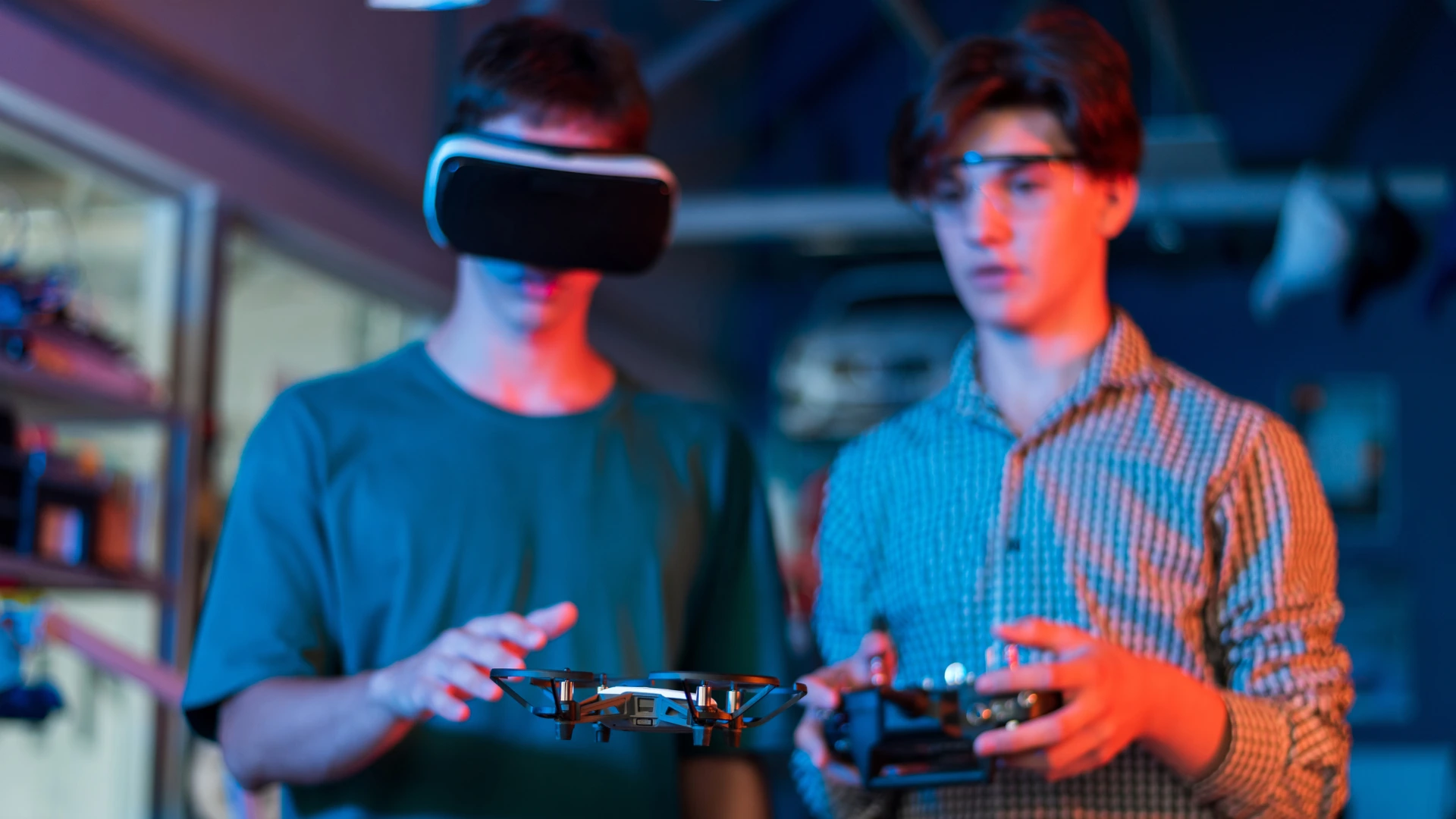 2 people wearing a VR headset experimenting with a new development in VR tech, symbolizing the future of VR for events