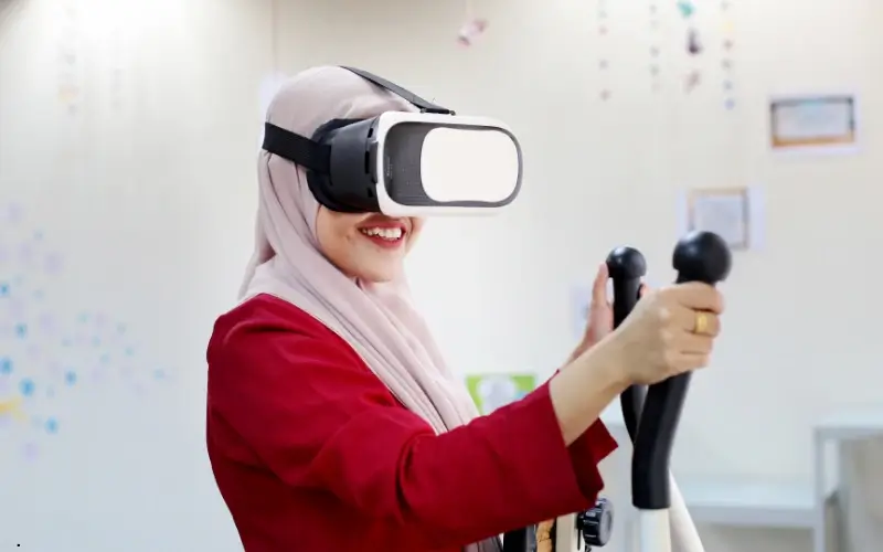 Woman using a VR headset while exercising on fitness equipment.