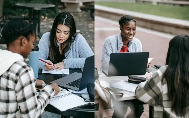 Students working together at outdoor tables with laptops and notes, discussing career plans and preparing for professional opportunities