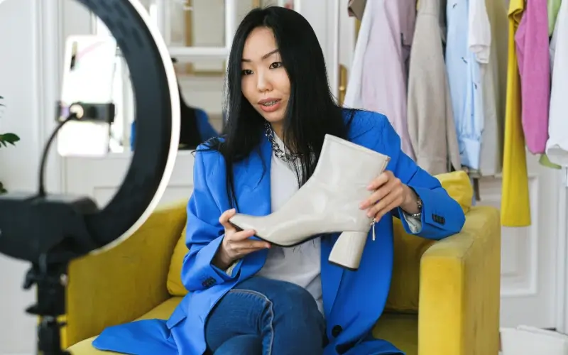 Influencer-led brand activation where a creator showcases and discusses a product during a live, social-first experience.